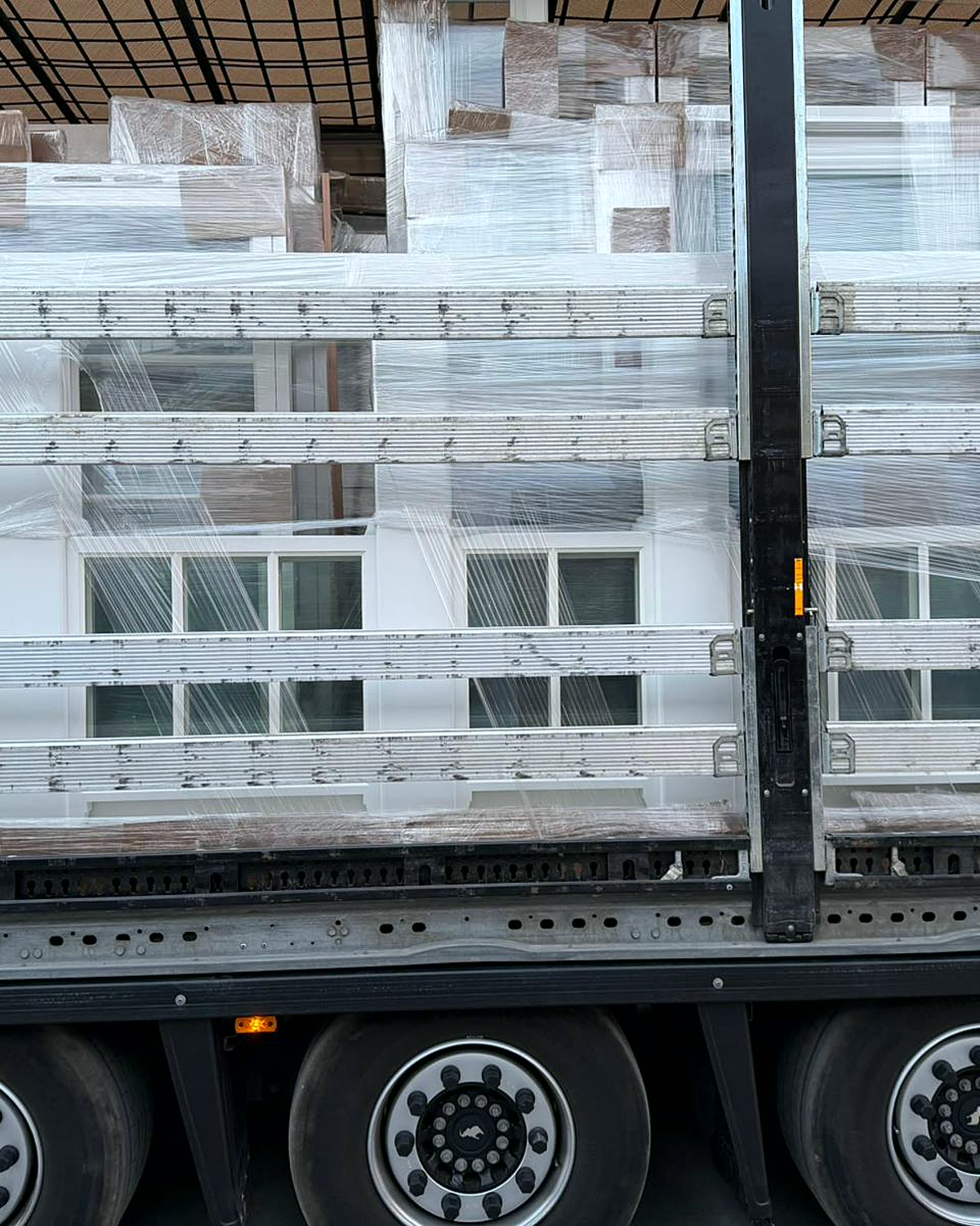 Full trailer load of wrapped timber windows ready for UK delivery